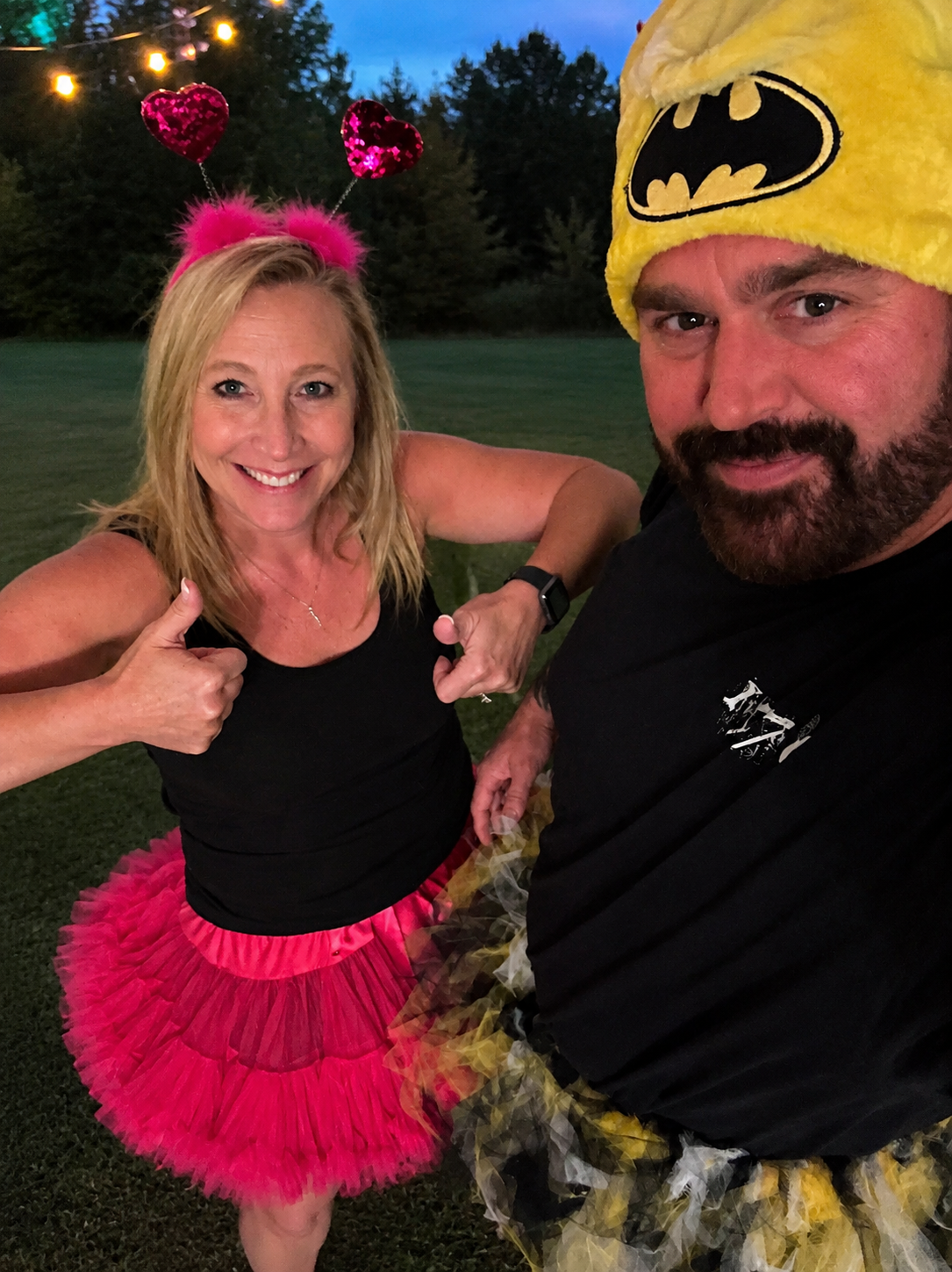 Ryan and Kelly Brown wearing fun, personal costumes, reflecting the family-oriented spirit behind their business.